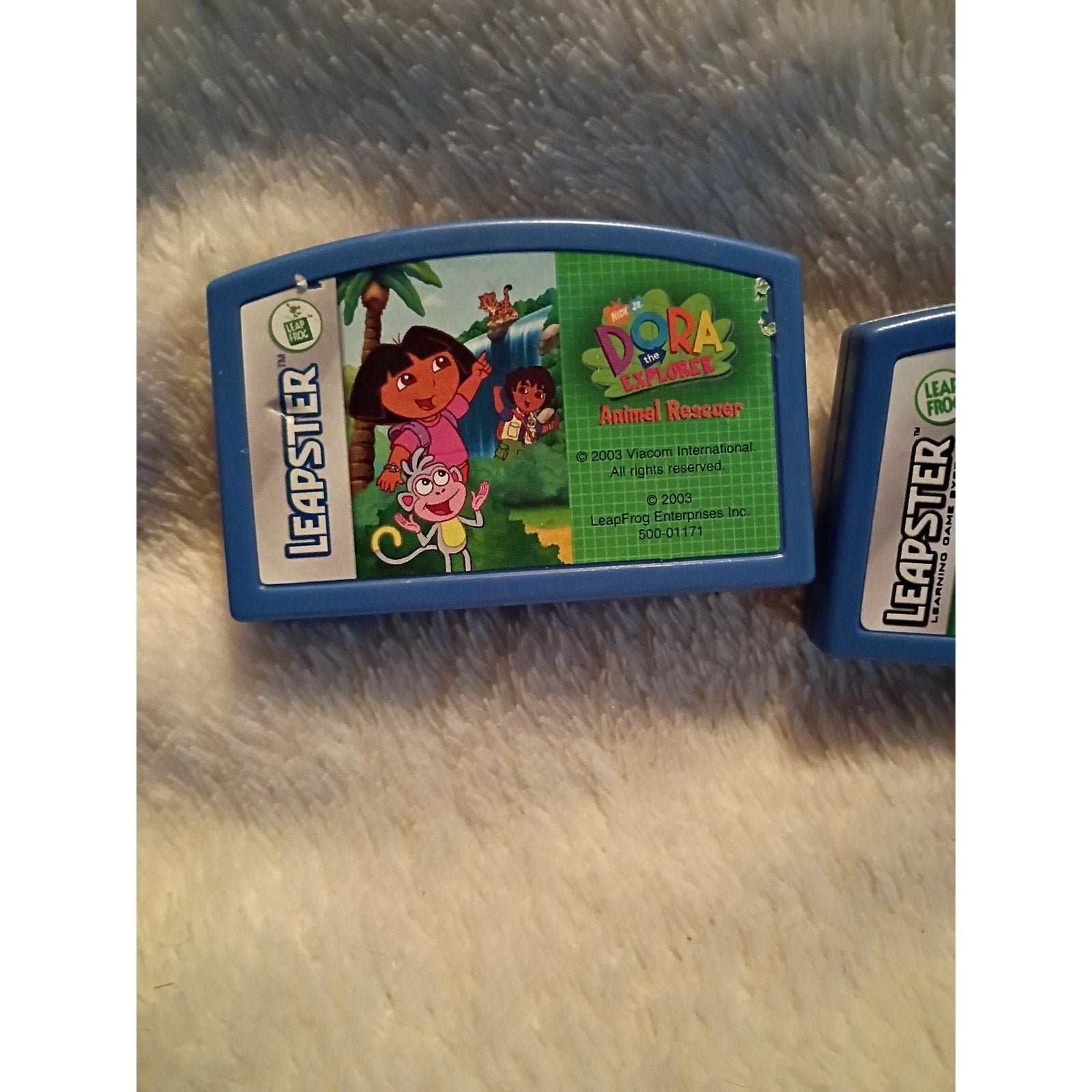 Leapster games DORA the EXPLORER PINATA PARTY & WILDLIFE RESCUE & Animal Rescue