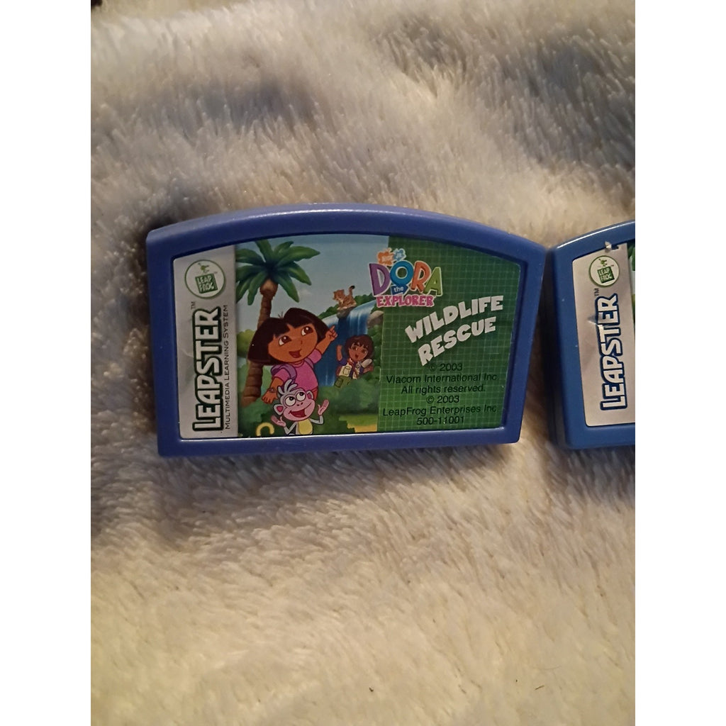 Leapster games DORA the EXPLORER PINATA PARTY & WILDLIFE RESCUE & Animal Rescue